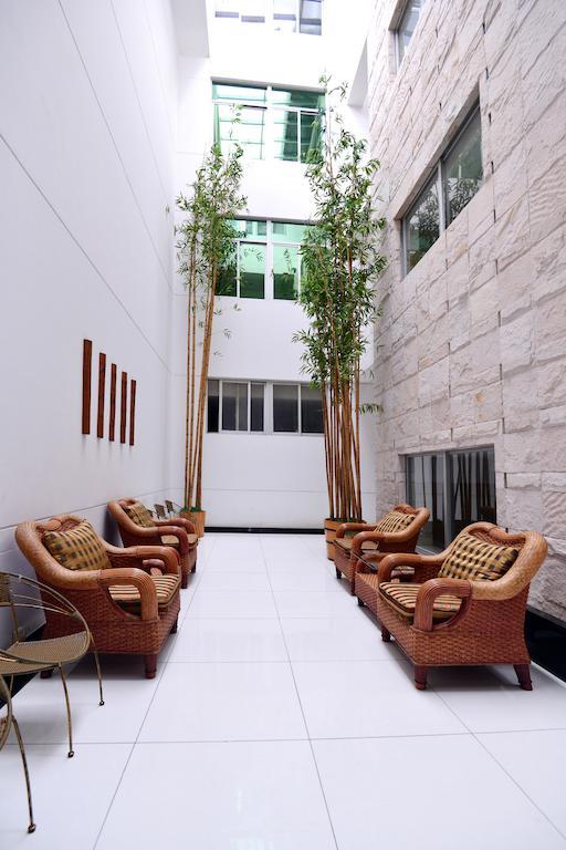 Baodao Exhibition Center Hotel Wuyishan  Bagian luar foto