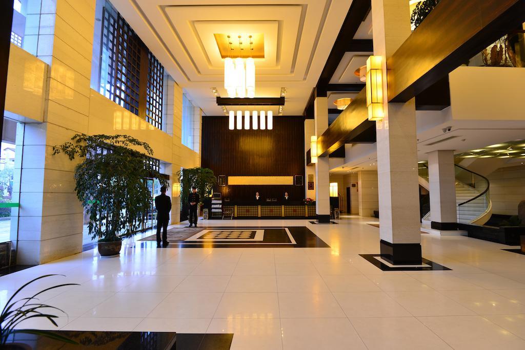 Baodao Exhibition Center Hotel Wuyishan  Bagian luar foto