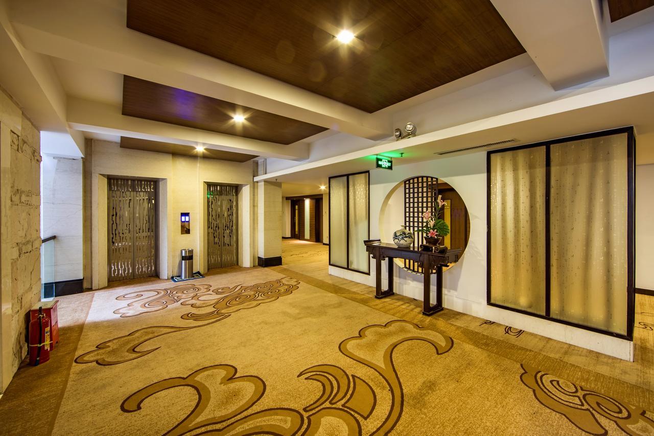 Baodao Exhibition Center Hotel Wuyishan  Bagian luar foto