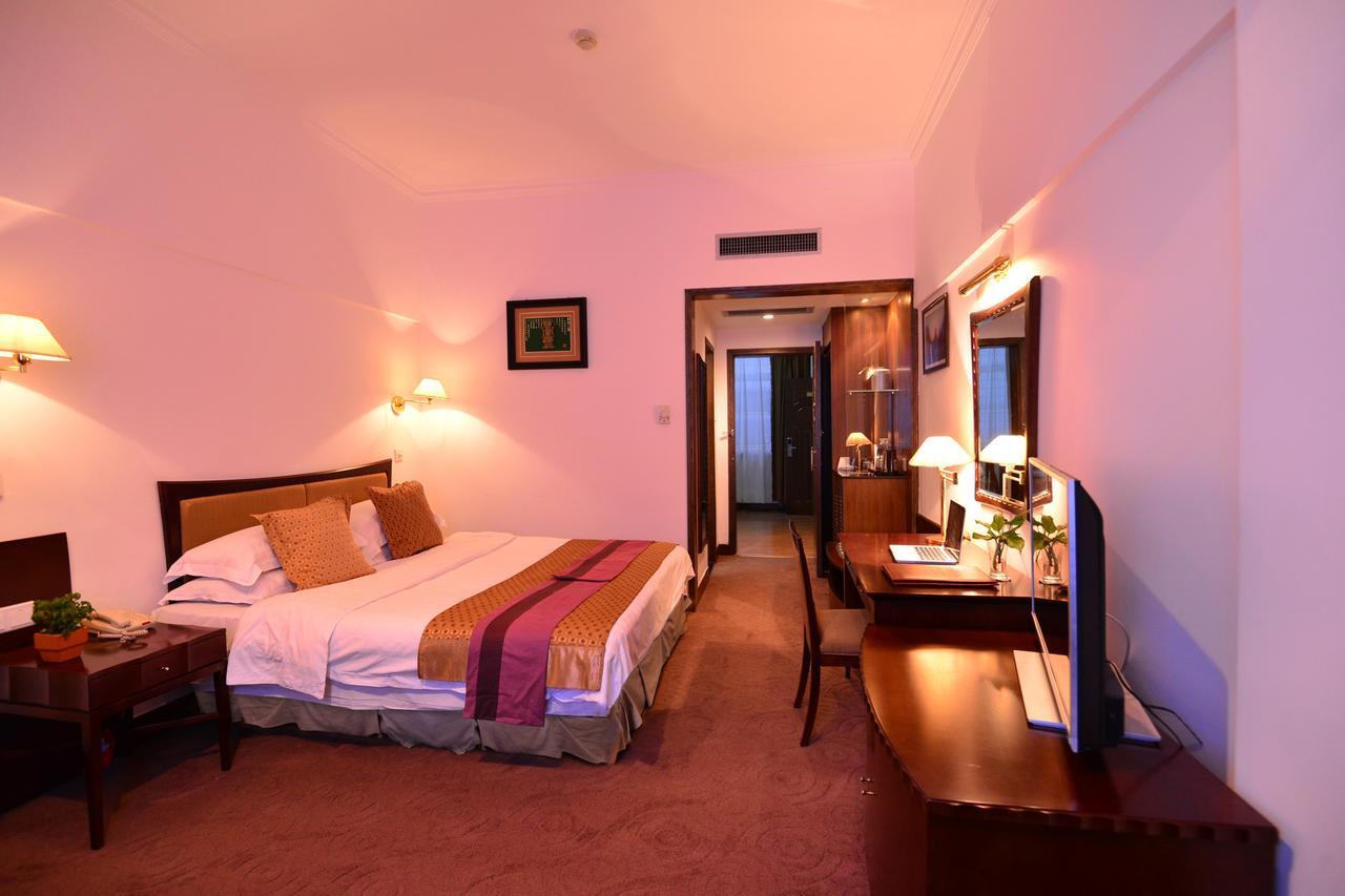 Baodao Exhibition Center Hotel Wuyishan  Bagian luar foto