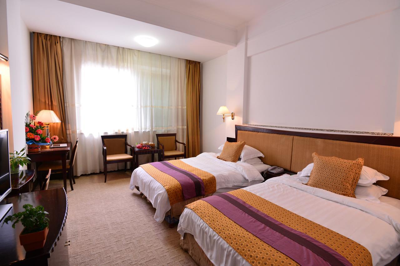 Baodao Exhibition Center Hotel Wuyishan  Bagian luar foto